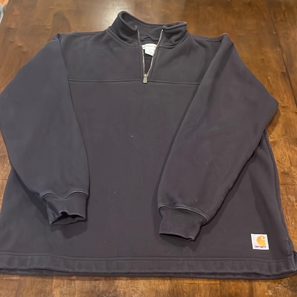 Men’s Black Carhartt 1/4 zip sweatshirt.
